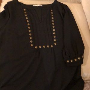 Black studded blouse.